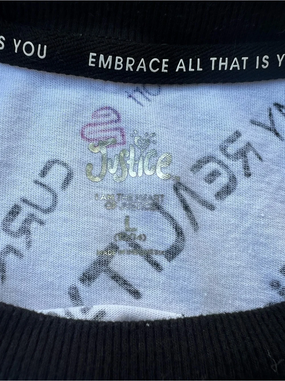 Justice White Tee with Black Trim and Multicolor Logo Print